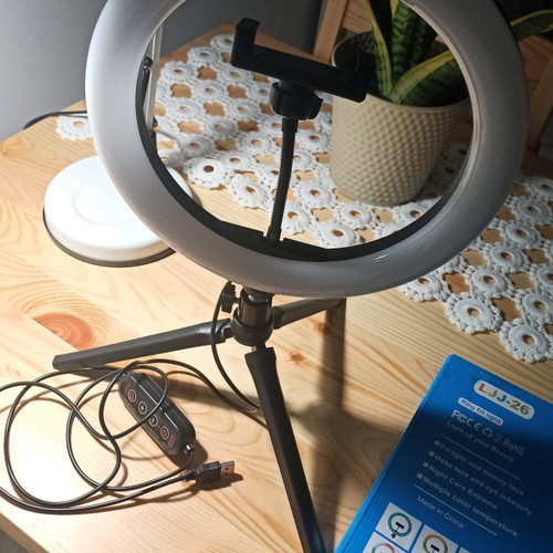Led ring light with phone holder used, remote control and RGB lighting