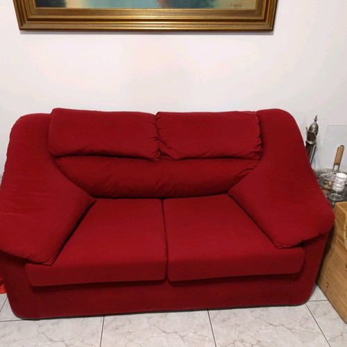 Two-seater waterproof sofa like new with removable cushions