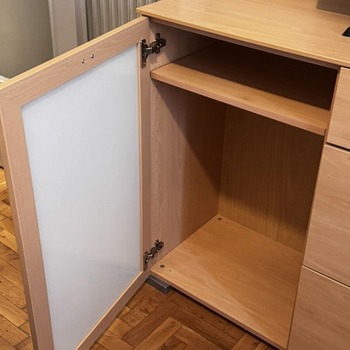 Wooden living room or bedroom furniture with drawers and cabinets