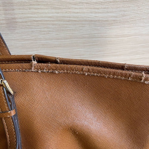Michael Kors bag used with wear on the trim