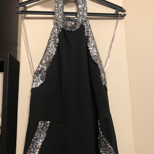 Black one-piece jumpsuit like new with sequin details