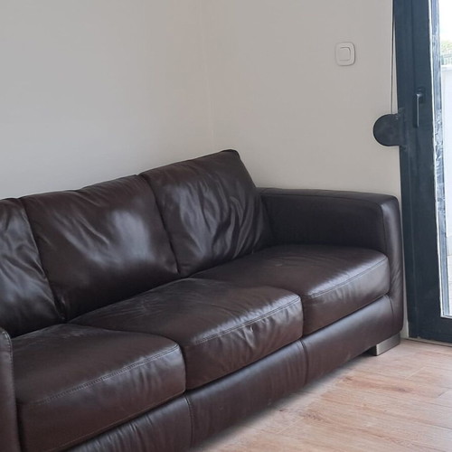 Leather three-seater sofa like new