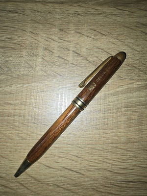 Wooden pen used with blue ink