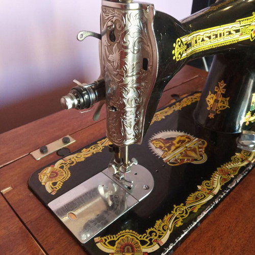 Mrsedes sewing machine used with antique furniture