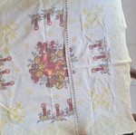 Small tablecloth with candles and fruit used