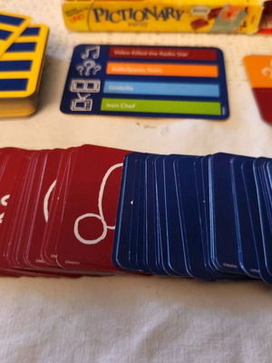 Pictionary used card game, speed and imagination play