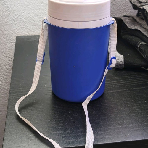 Plastic water jug like new, blue and white with straw