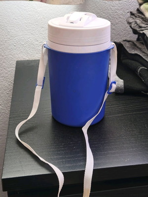 Plastic water jug like new, blue and white with straw