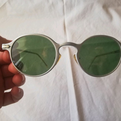Sisley sunglasses used with silver metal frame and green lenses
