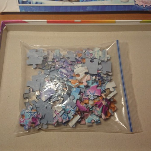 Frozen puzzle 104 pieces used with Snow White storybook gift