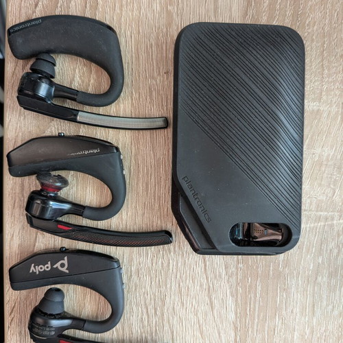 Plantronics Bluetooth headsets used, 2x 5200 and 1x Edge with charger case