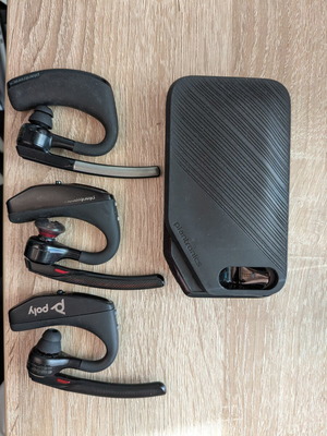 Plantronics Bluetooth headsets used, 2x 5200 and 1x Edge with charger case