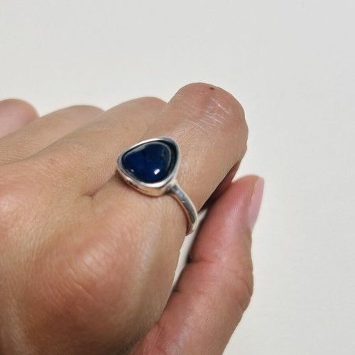 Silver ring with dark blue agate stone