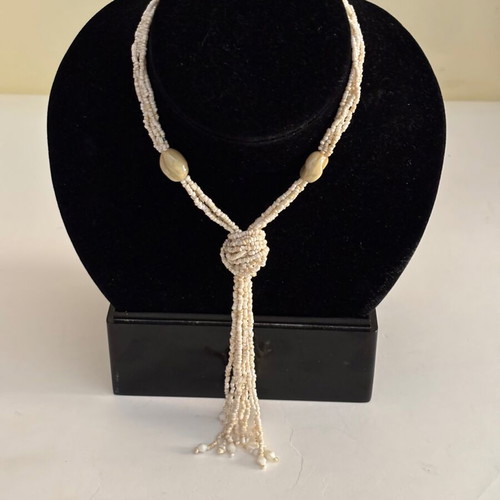 Handmade necklace used with small beads, beige