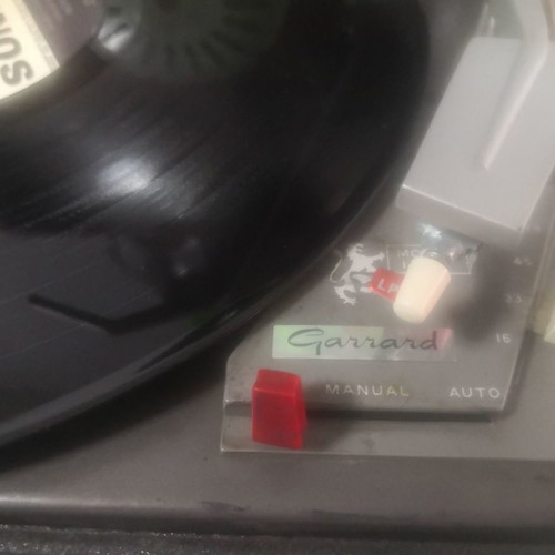 Red Garrard collectible pick up used with built-in speaker