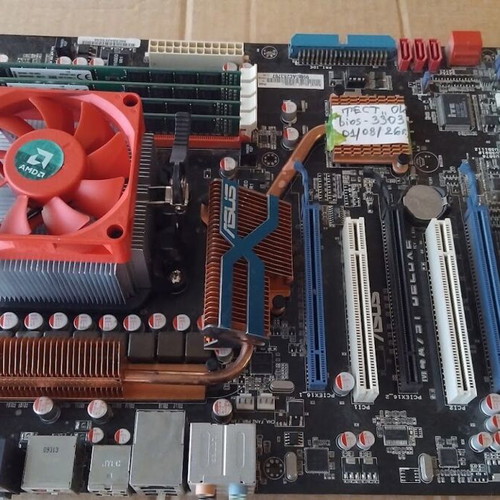 Asus M4A79T Deluxe motherboard used with CPU, fan and 16GB RAM