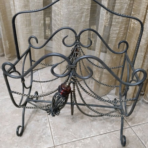 Forged metal magazine and newspaper holder like new, vintage
