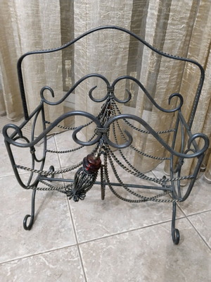 Forged metal magazine and newspaper holder like new, vintage