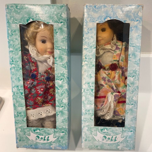 BC porcelain dolls like new, set of 2 pieces