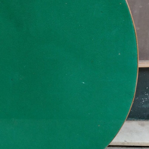 Round table used with green felt and folding beech legs