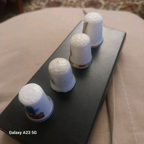 Souvenir thimbles like new