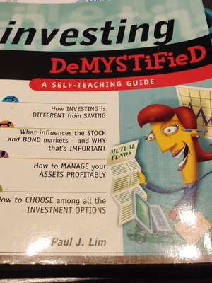 Investing Demystified book by Paul Lim like new, beginner investing guide