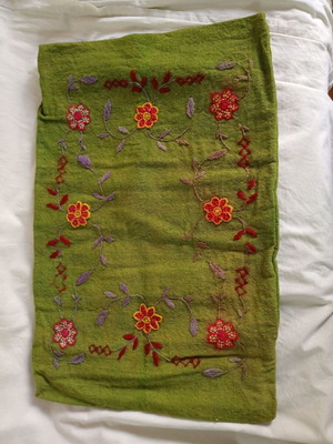 Embroidered green pillowcase used with details