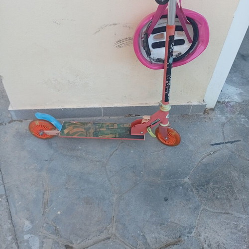 Scooter with helmet used, fully functional