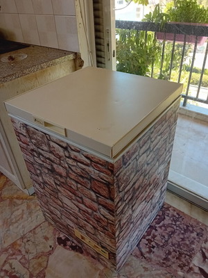 Freezer with stone decor on two sides, used