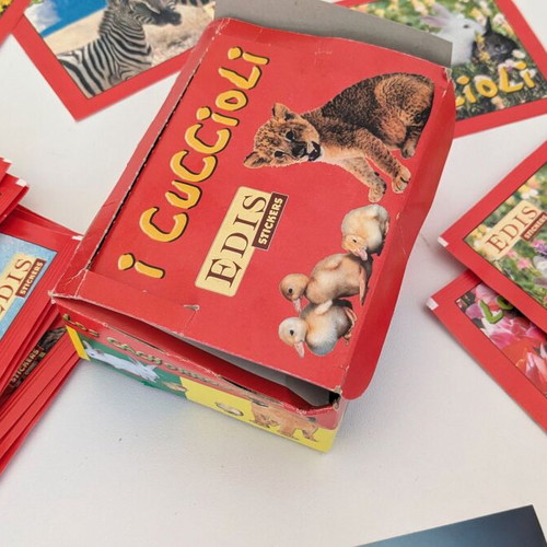 EDIS Stickers 1999 new, 33 sealed packs with puppy stickers