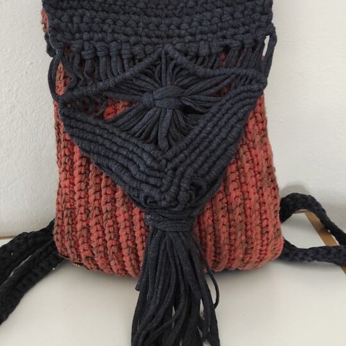 Knitted backpack like new, orange with leather hamsa detail