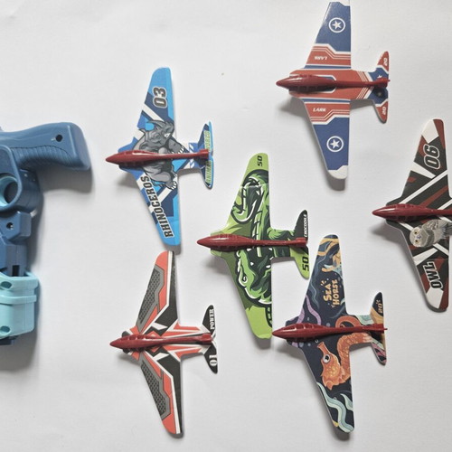 Children's toy gun with paper airplane launcher, new, set of 6 planes