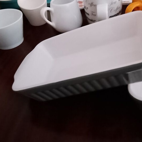 Porcelain kitchenware set with ovenproof cookware, cups and shot glasses