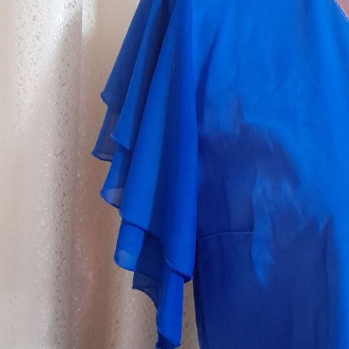Blue dress with flutter sleeves and V-neck