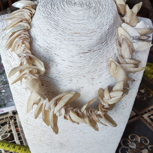 Vintage necklace made of natural shells in boho brutalist style, used
