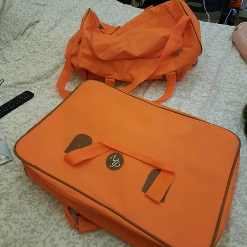 Suitcase and travel sack set like new, orange waterproof material