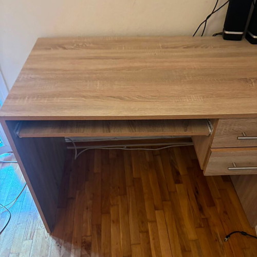 Wooden desk with sliding shelf and 2 drawers, like new