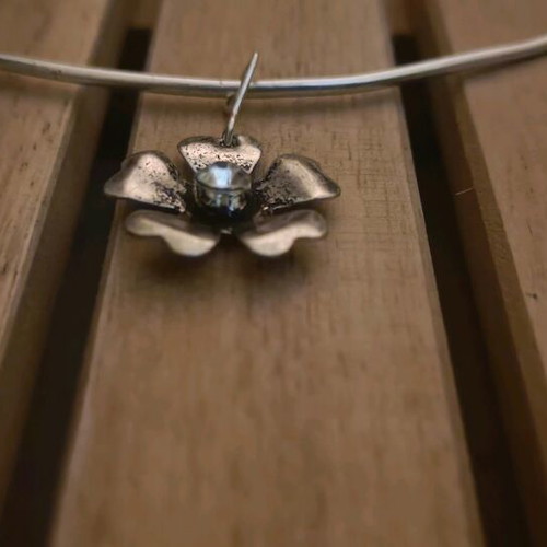 Silver-colored handmade necklace with flower like new