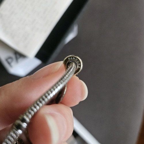 Pandora sterling silver charm bracelet with heart and sister charms like new