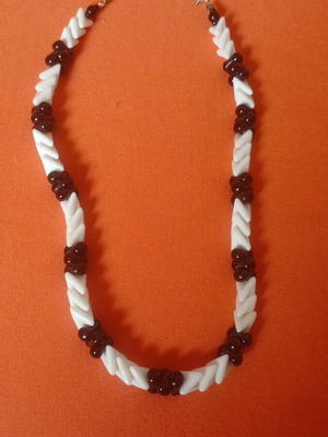 Vintage fishbone necklace with porcelain beads and silver clasp like new