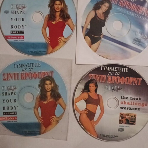 Gymnastics DVD collection with Cindy Crawford like new, 4 discs