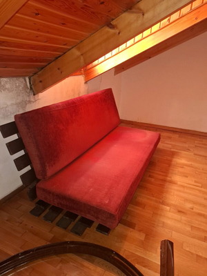 Red sofa in simple condition