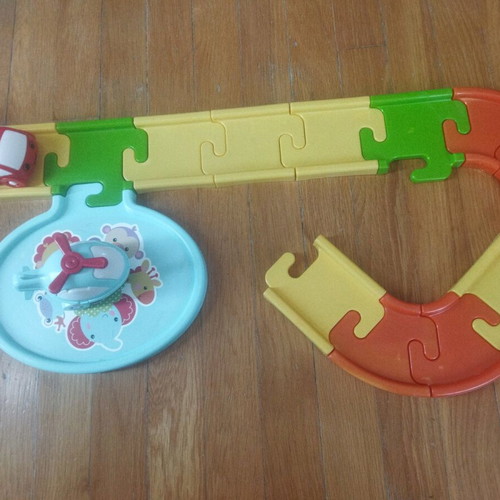 Fisher Price car track used with 2 cars and helicopter