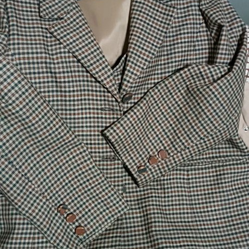 Checked suit used, classic style