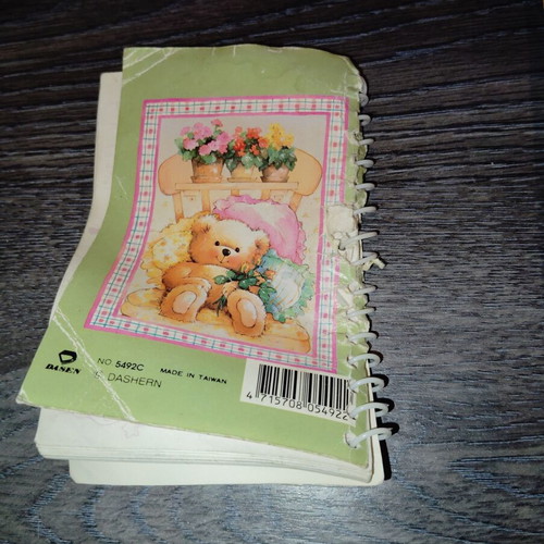 Small notebook used with creases and missing pages