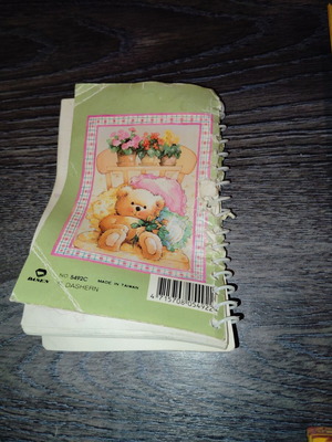 Small notebook used with creases and missing pages