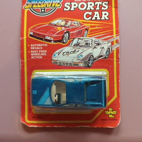 Vintage metal toy car like new, sealed packaging