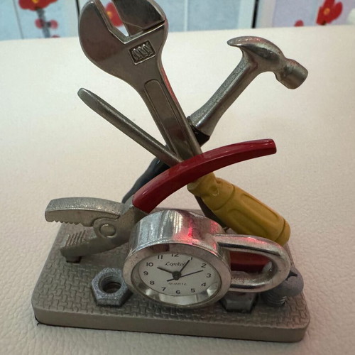 Decorative tabletop clock like new with tools theme