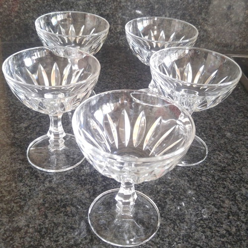 Stemmed champagne or cocktail glasses set of 5, like new, carved design