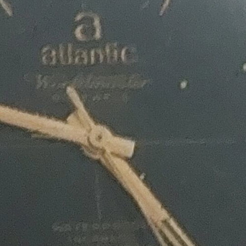 Atlantic winding watch used with slight glass wear